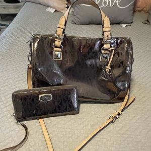 Michael Kors purse and wallet. Used only a few times. Very clean.